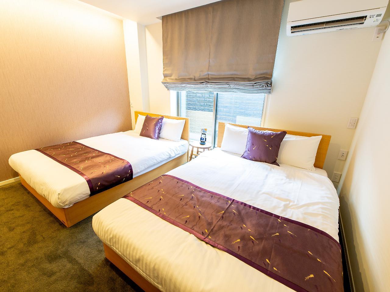 Grand Base Hiroshima Ekimae Aparthotel Exterior photo