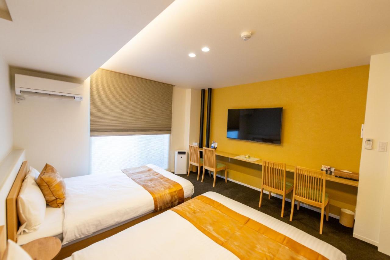 Grand Base Hiroshima Ekimae Aparthotel Exterior photo